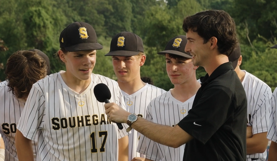 Berkley Stevens interviewing Souhegan baseball players on-camera after an NHIAA playoff game